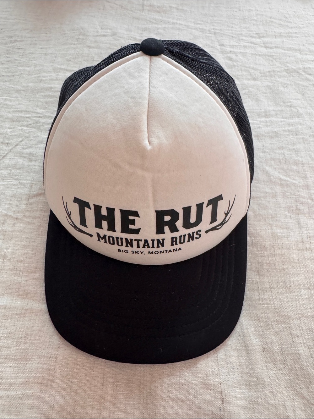 The Rut Mountain Runs Trucker Hat - Black & White Logo